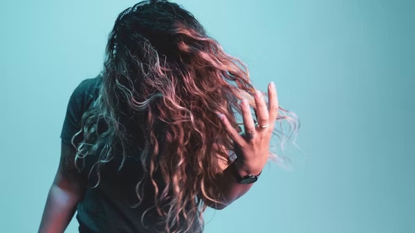 Woman with curly hair